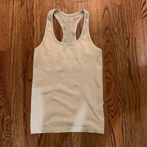 Lulu lemon size 4 light blue tank run swiftly tech